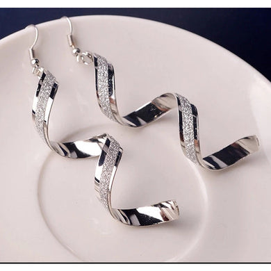 Silver Spiral Dangle Earrings.